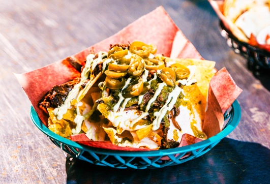 Rodeo City Provisions' loaded brisket nachos with jalapeños and house-made sauce